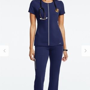 Jaanuu gold zippered scrub set top and bottoms navy blue